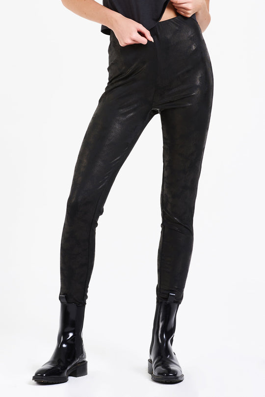 image of a female model wearing a DAPHNE SUPER HIGH RISE ANKLE LEGGING BLACK COATED DEAR JOHN DENIM 