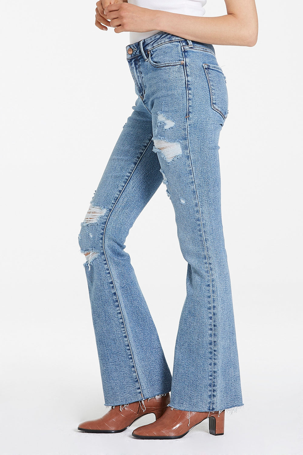image of a female model wearing a JAXTYN HIGH RISE BOOTCUT JEANS GLASS BEACH JEANS