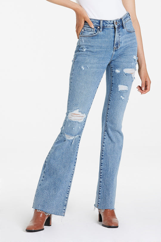 image of a female model wearing a JAXTYN HIGH RISE BOOTCUT JEANS GLASS BEACH JEANS
