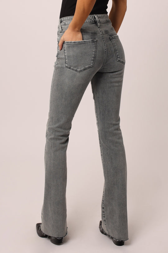 image of a female model wearing a JAXTYN HIGH RISE BOOTCUT JEANS MIDDLEBROOK JEANS