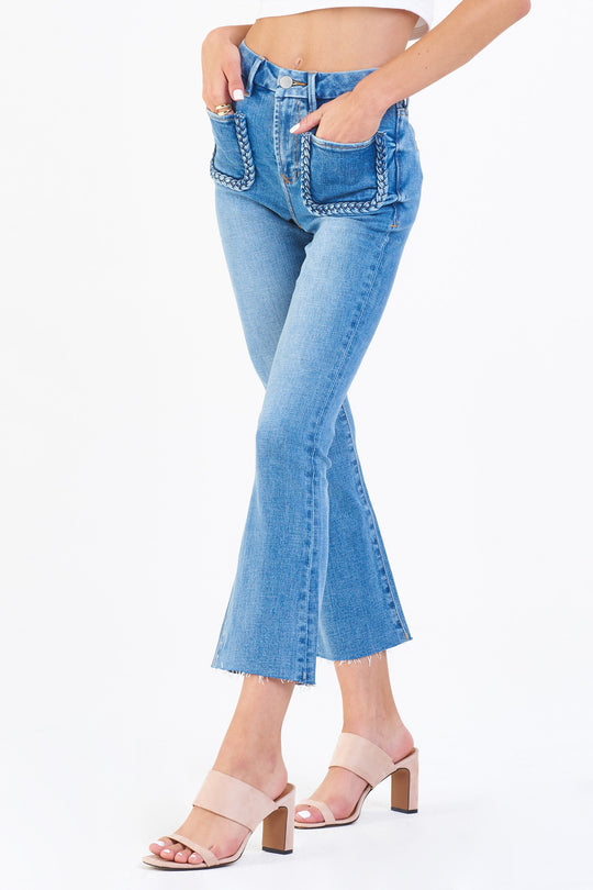 image of a female model wearing a JEANNE SUPER HIGH RISE CROPPED FLARE LEG JEANS STONEY LANE JEANS
