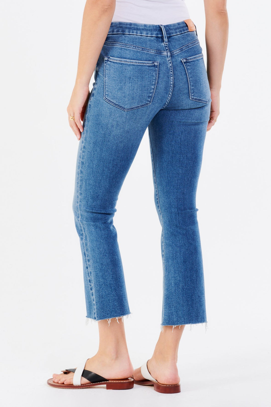image of a female model wearing a JEANNE SUPER HIGH RISE CROPPED FLARE JEANS ESCAPE JEANS