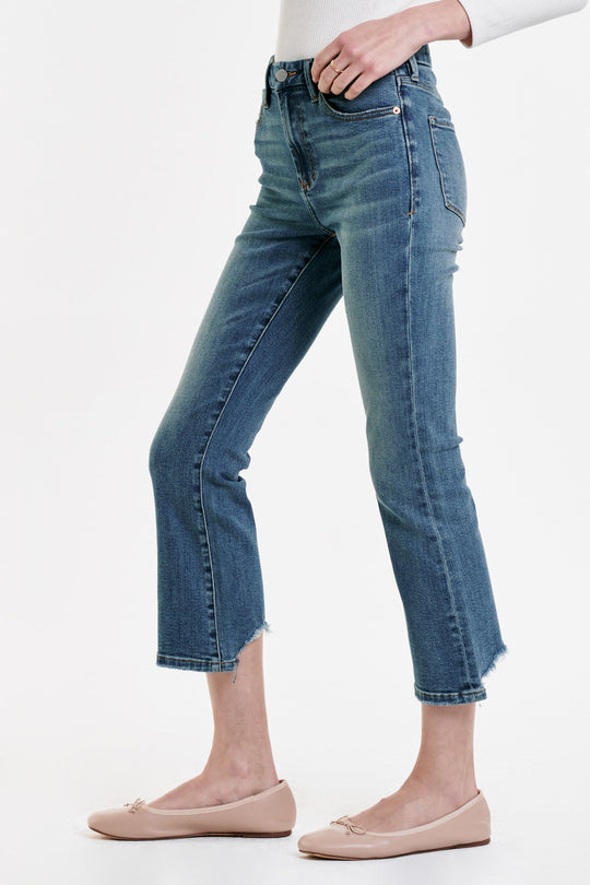 image of a female model wearing a JEANNE SUPER HIGH RISE CROPPED FLARE JEANS CAMBRION DEAR JOHN DENIM 
