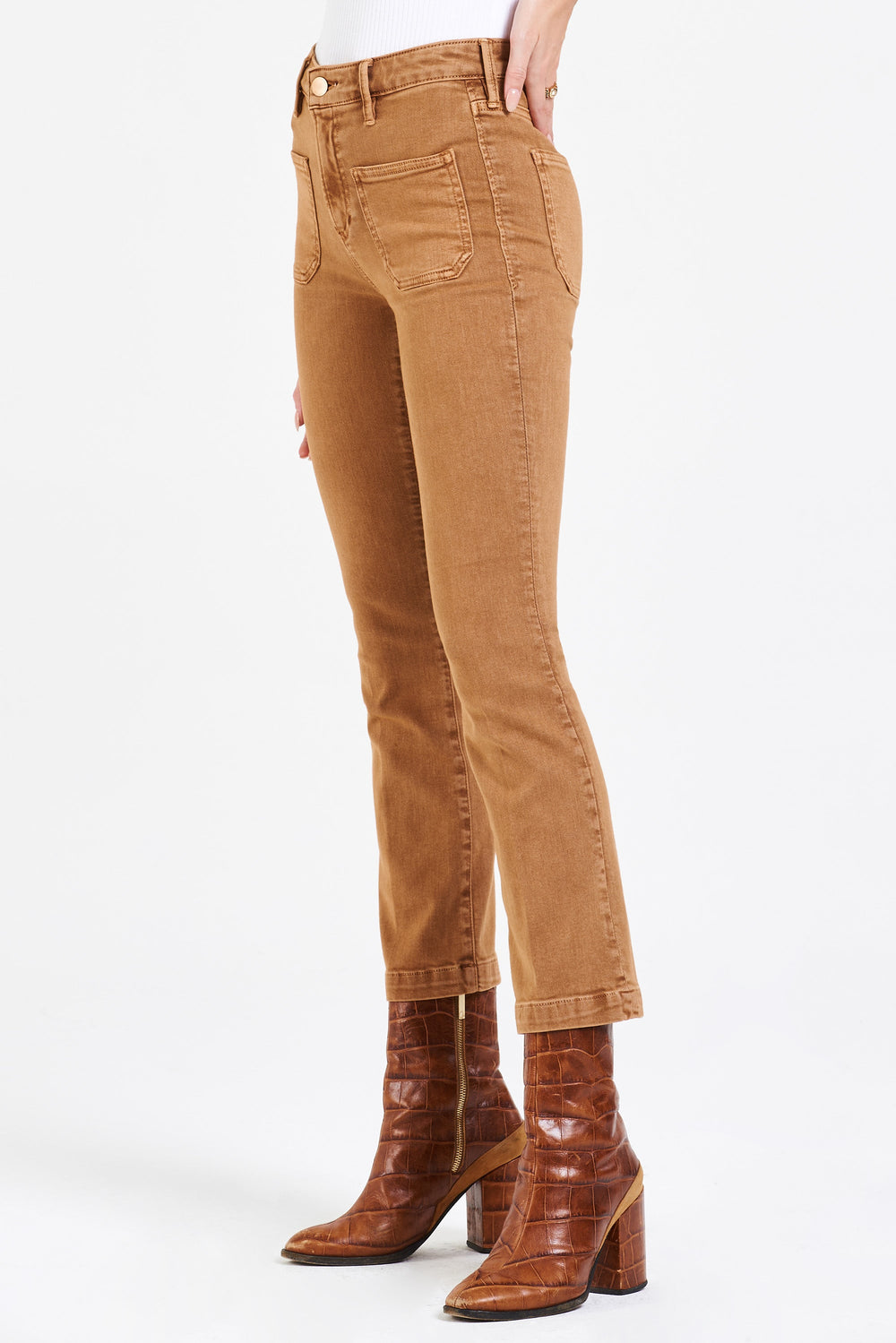 image of a female model wearing a JEANNE SUPER HIGH RISE CROPPED FLARE LEG JEANS BUTTERSCOTCH JEANS