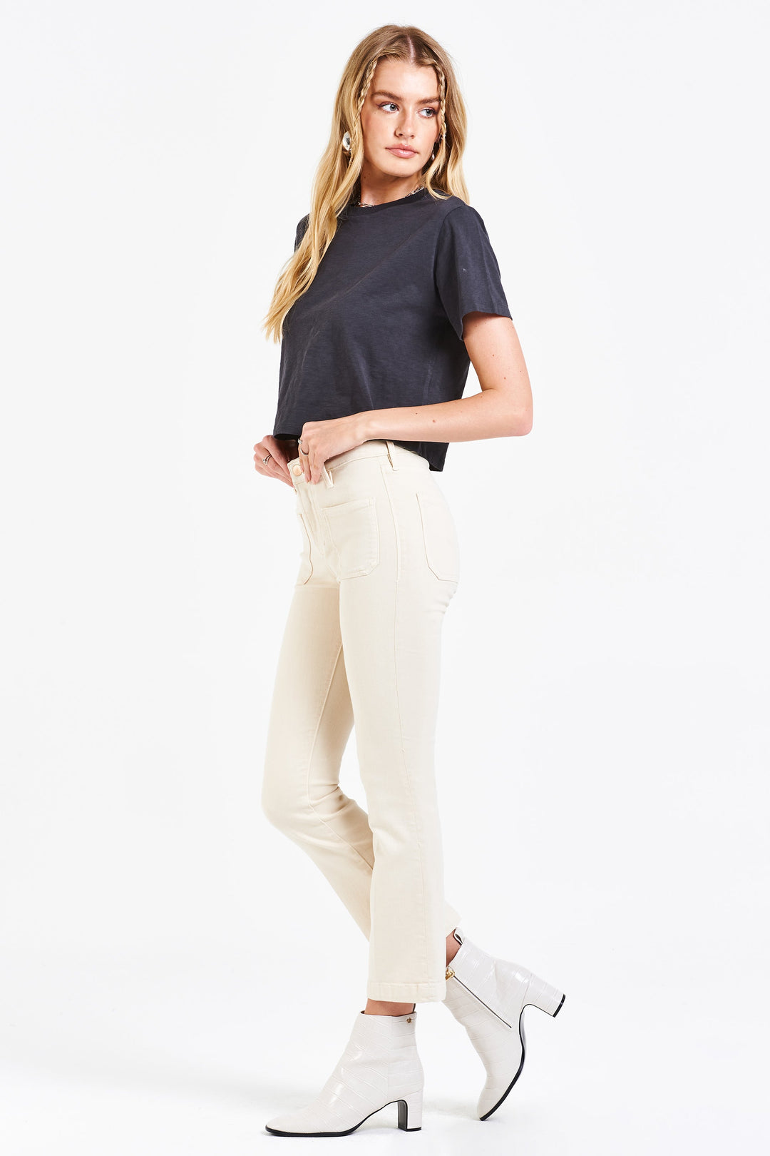 image of a female model wearing a JEANNE SUPER HIGH RISE CROPPED FLARE LEG JEANS VANILLA JEANS