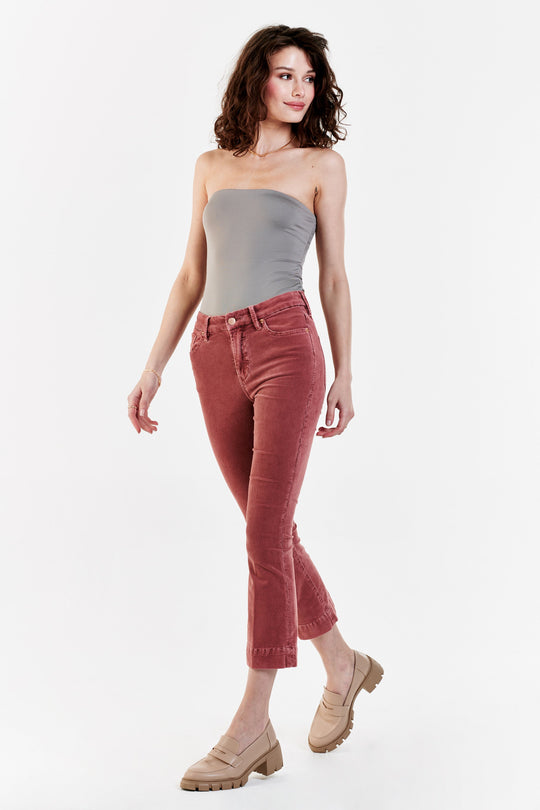 image of a female model wearing a JEANNE SUPER HIGH RISE CROPPED FLARE CORDUROY PANTS CINNAMON DEAR JOHN DENIM 