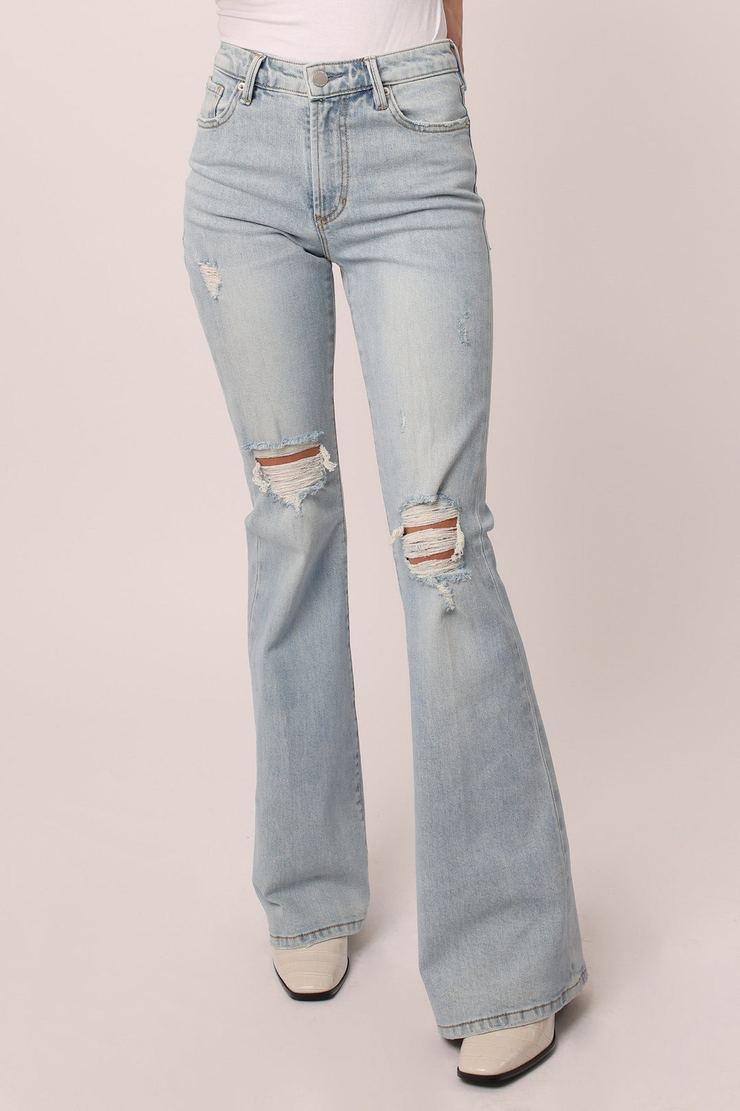 image of a female model wearing a LANEY HIGH RISE FLARE LEG JEANS WINDMILL JEANS