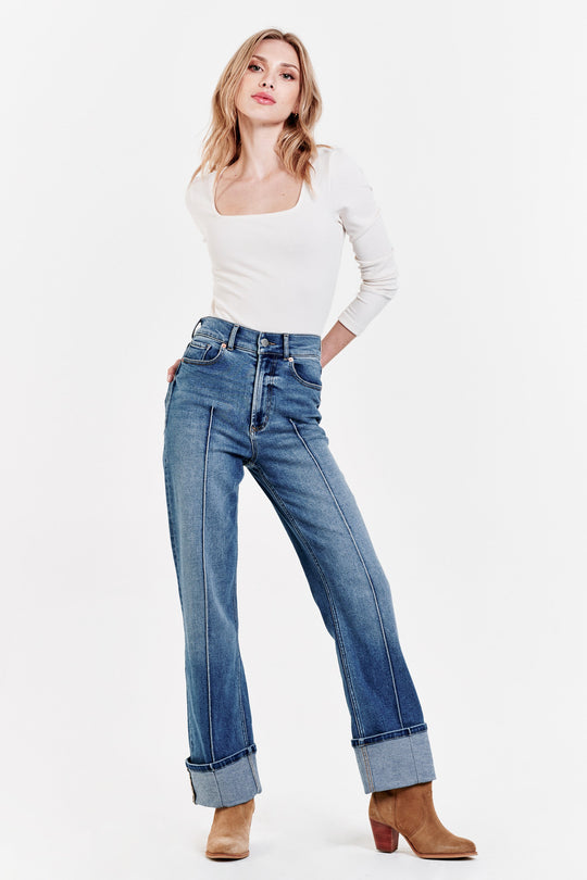 image of a female model wearing a HOLLY SUPER HIGH RISE CUFFED STRAIGHT JEANS JUSTICE DEAR JOHN DENIM 