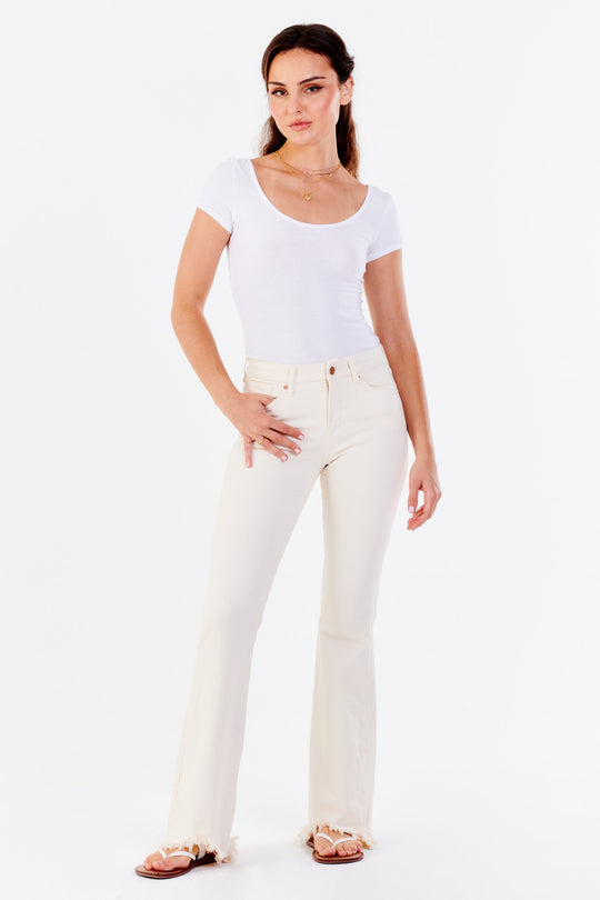 image of a female model wearing a ROSA HIGH RISE FLARE LEG JEANS WHEAT JEANS