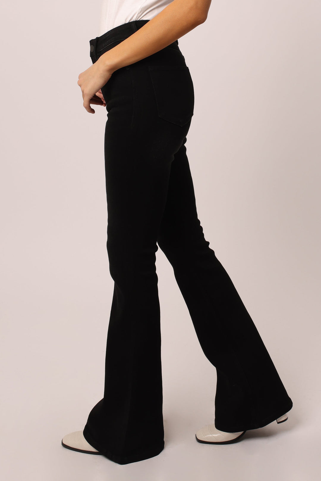 image of a female model wearing a LANEY HIGH RISE FLARE LEG JEANS BLACKWELL JEANS