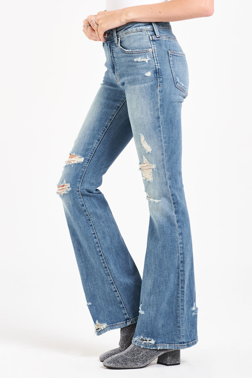 image of a female model wearing a ROSA HIGH RISE FLARE LEG JEANS ELM GROVE JEANS