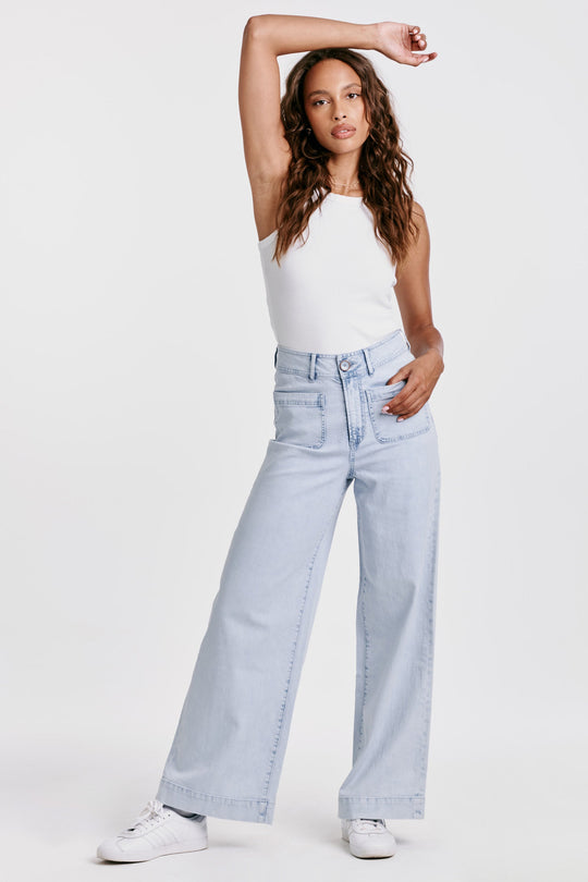 image of a female model wearing a AUDREY SUPER HIGH RISE WIDE LEG JEANS ARTHLOW DEAR JOHN DENIM 