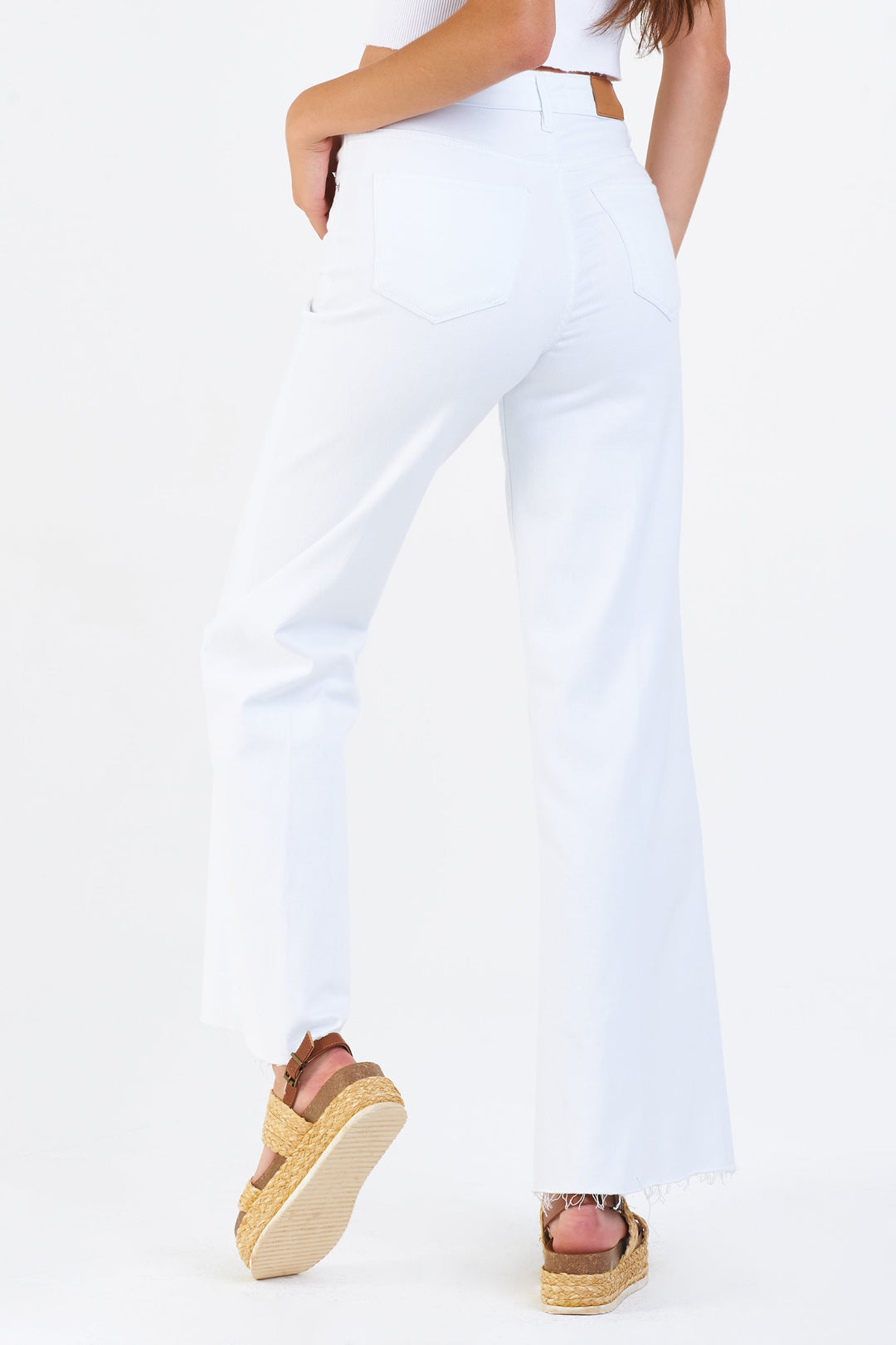 image of a female model wearing a FIONA SUPER HIGH RISE WIDE LEG JEANS OPTIC WHITE JEANS
