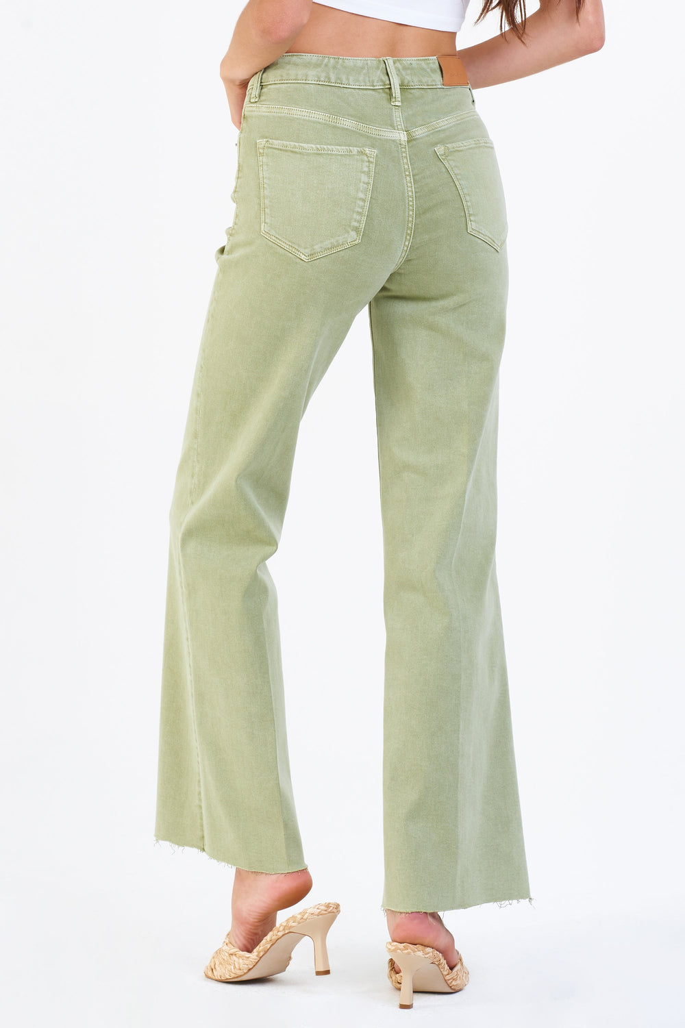 image of a female model wearing a FIONA SUPER HIGH RISE WIDE LEG JEANS PESTO JEANS