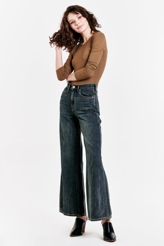 image of a female model wearing a FIONA SUPER HIGH RISE WIDE LEG JEANS BORDEOUX DEAR JOHN DENIM 
