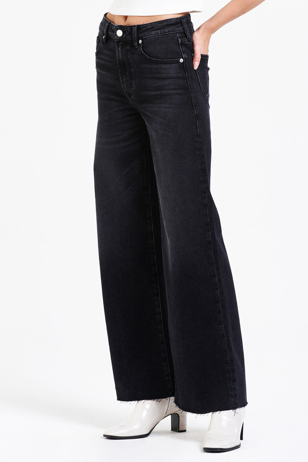 image of a female model wearing a FIONA SUPER HIGH RISE WIDE LEG JEANS STONELEIGH JEANS