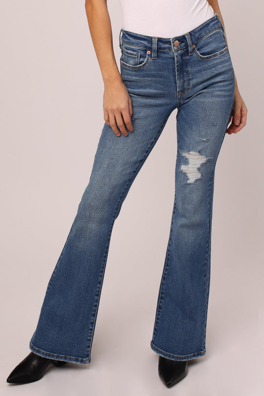 image of a female model wearing a ROSA HIGH RISE FLARE JEANS PATAGONIA | DEAR JOHN DENIM JEANS
