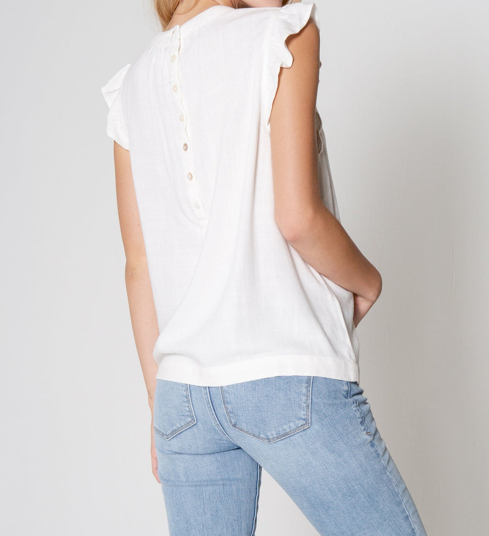 image of a female model wearing a LISA TOP IN WHITE TOPS