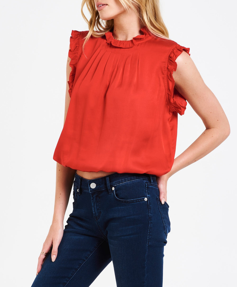 image of a female model wearing a MELISSA RUFFLES SILKY TOP BARBERRY DEAR JOHN DENIM 