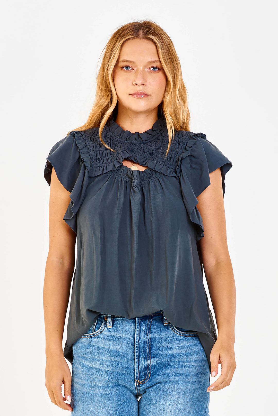 image of a female model wearing a DEANNA RUFFLE TOP EVERGREEN TOPS