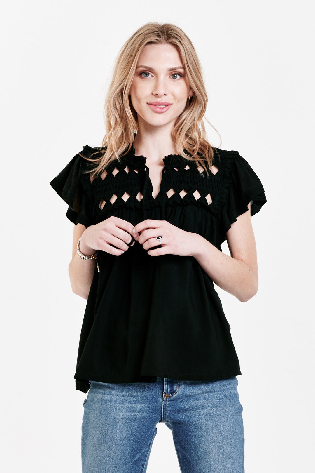 image of a female model wearing a KEIZA KNOTTED EMBROIDERY TOP BLACK TOPS