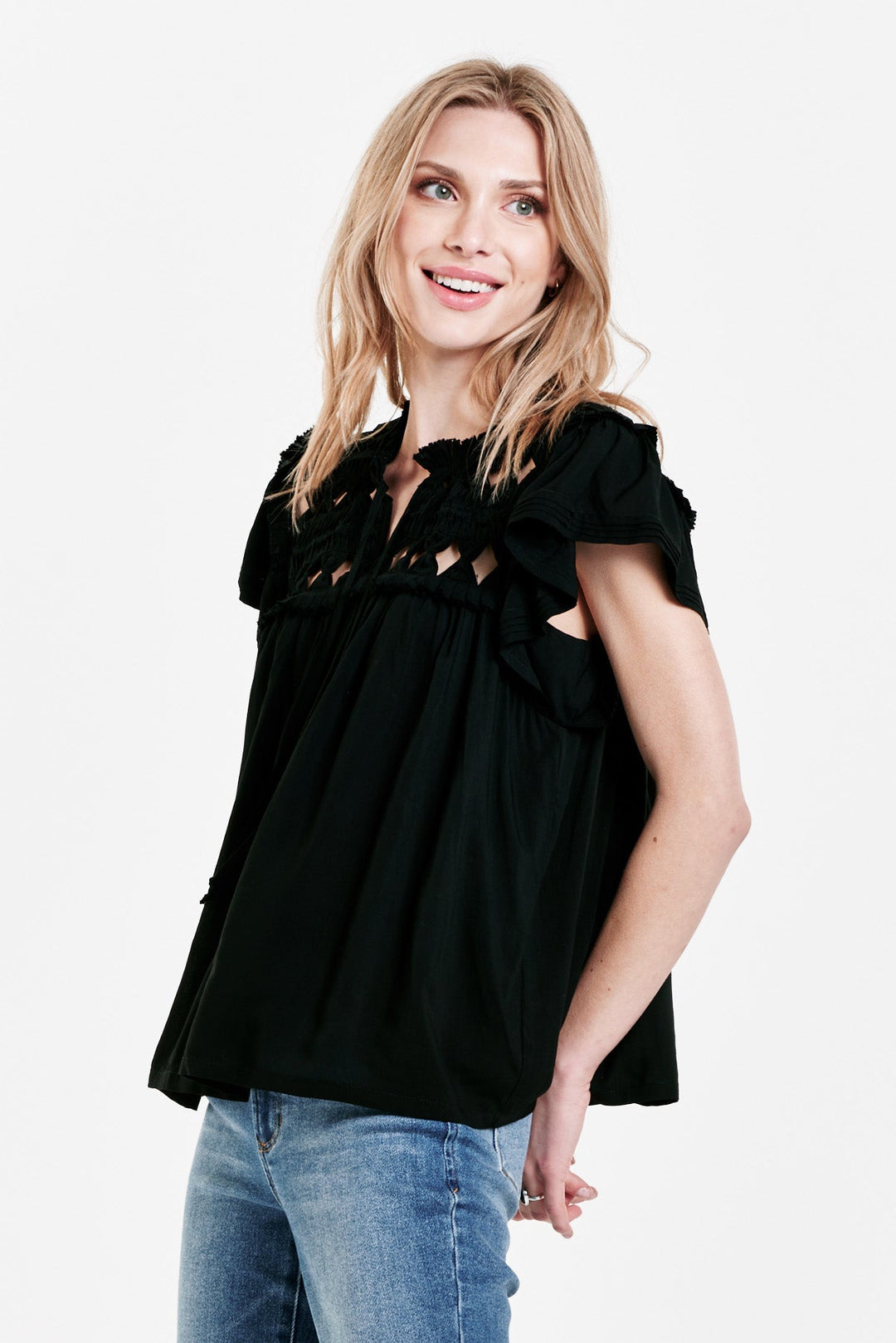 image of a female model wearing a KEIZA KNOTTED EMBROIDERY TOP BLACK TOPS