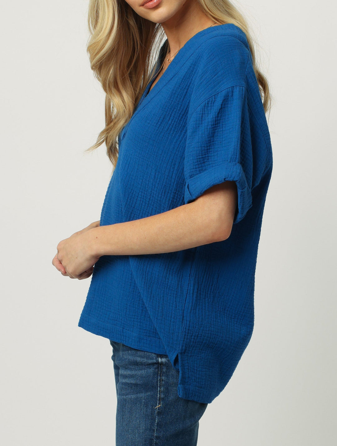 image of a female model wearing a JAILEE SHORT SLEEVE V-NECK TOP LAPIS BLUE DEAR JOHN DENIM 