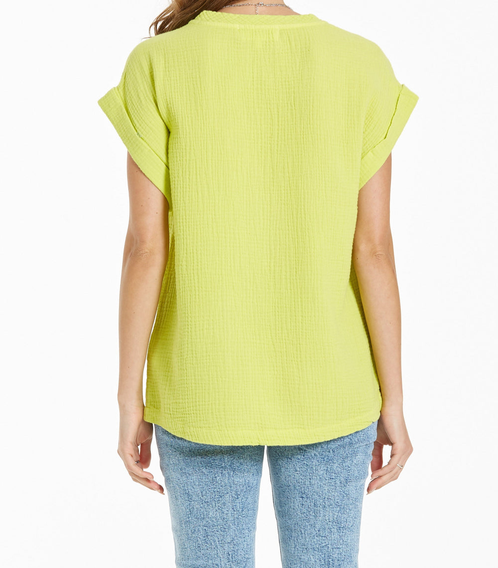 image of a female model wearing a CAMILA DROP SHOULDER TOP LIMELIGHT TOPS