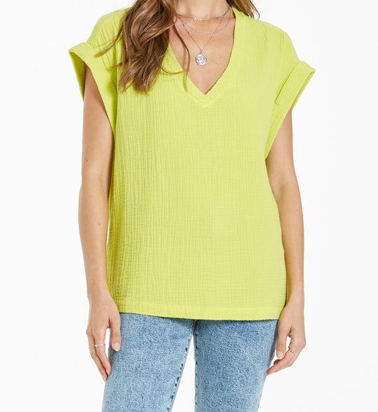 image of a female model wearing a CAMILA DROP SHOULDER TOP LIMELIGHT TOPS