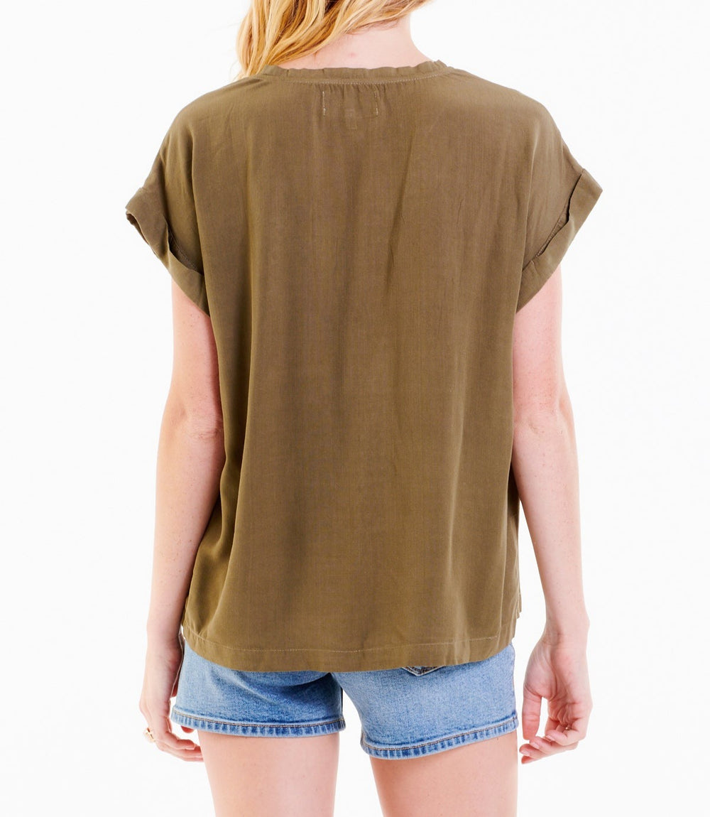 image of a female model wearing a CAMILA DROP SHOULDER TOP OLIVE BRANCH DEAR JOHN DENIM 