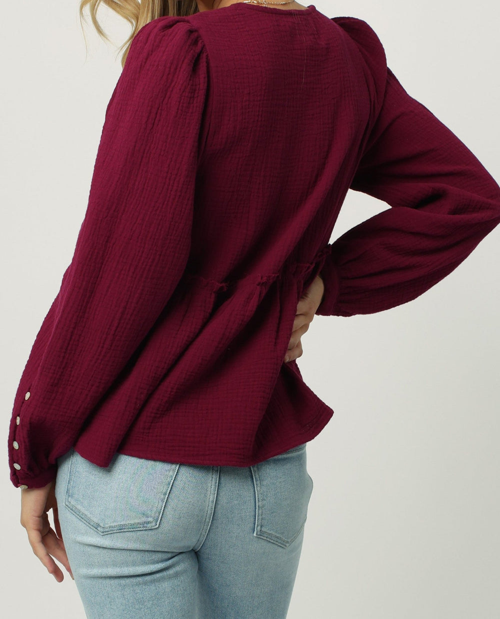 image of a female model wearing a OAKLYNN VNECK LONG SLEEVE SHIRT FESTIVAL FUCHSIA DEAR JOHN DENIM 