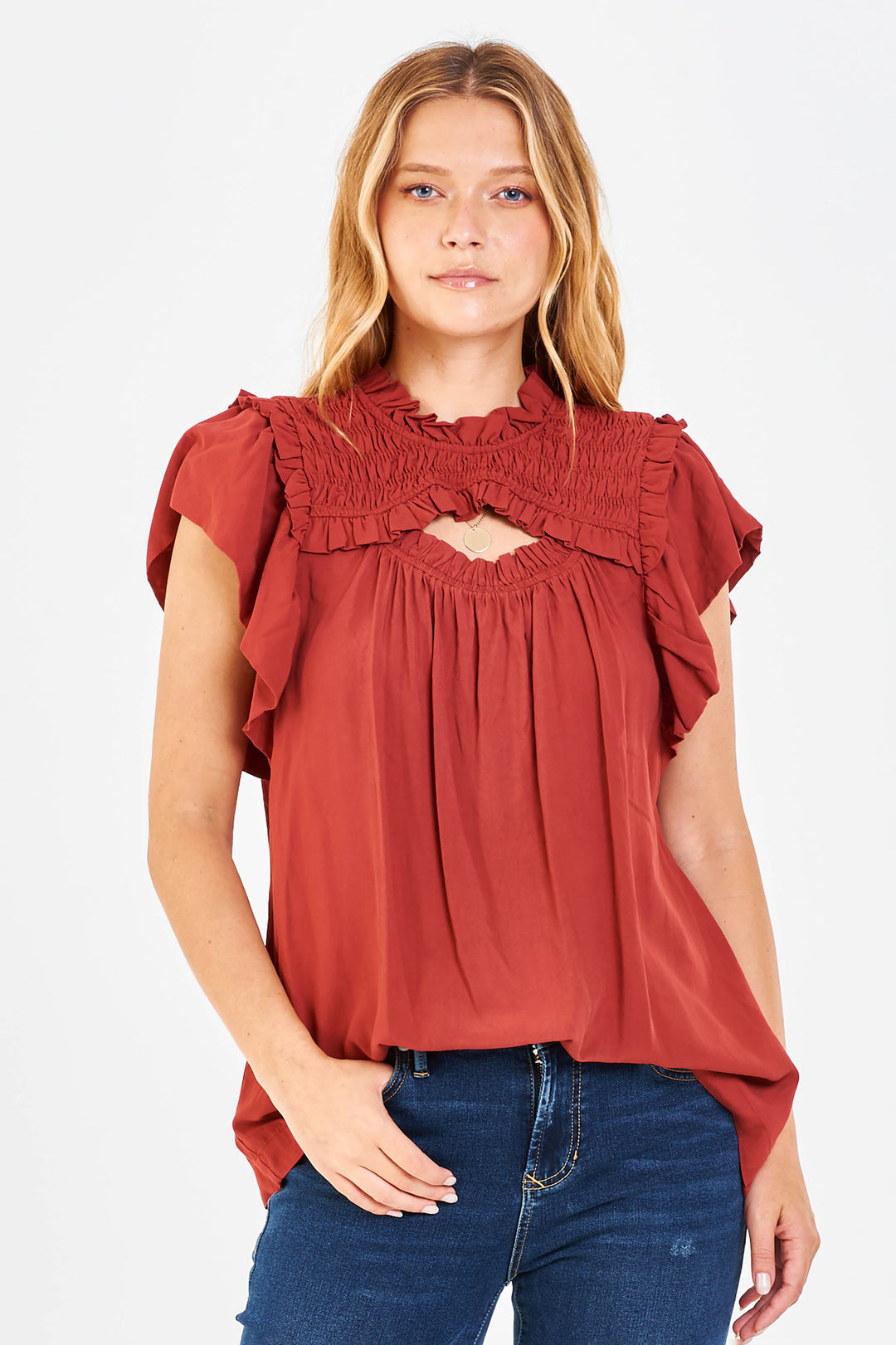 image of a female model wearing a DEANNA RUFFLE TOP MELLOW MAUVE TOPS