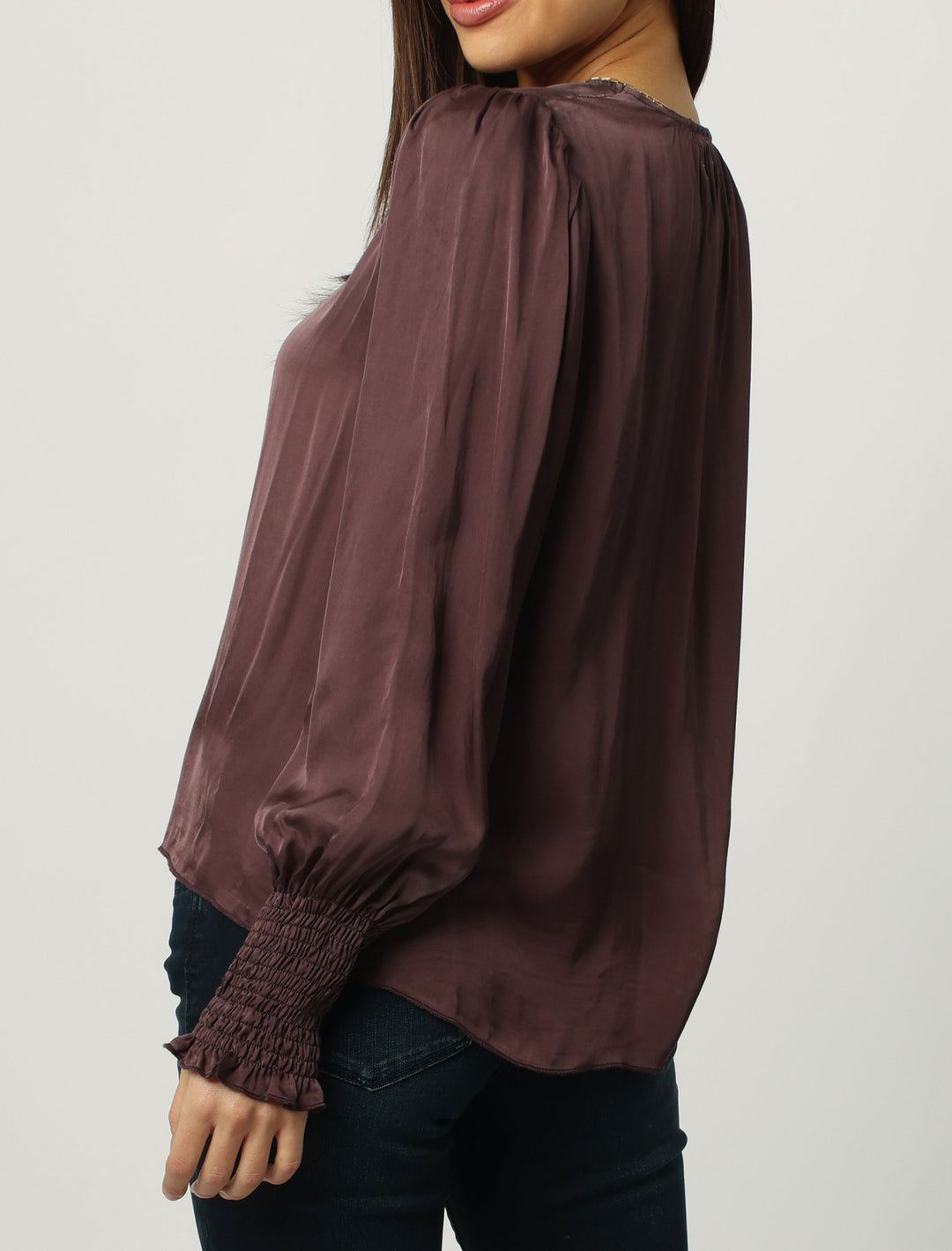 image of a female model wearing a AMELIA RUCHED LONG SLEEVE TOP DARK OAK TOPS