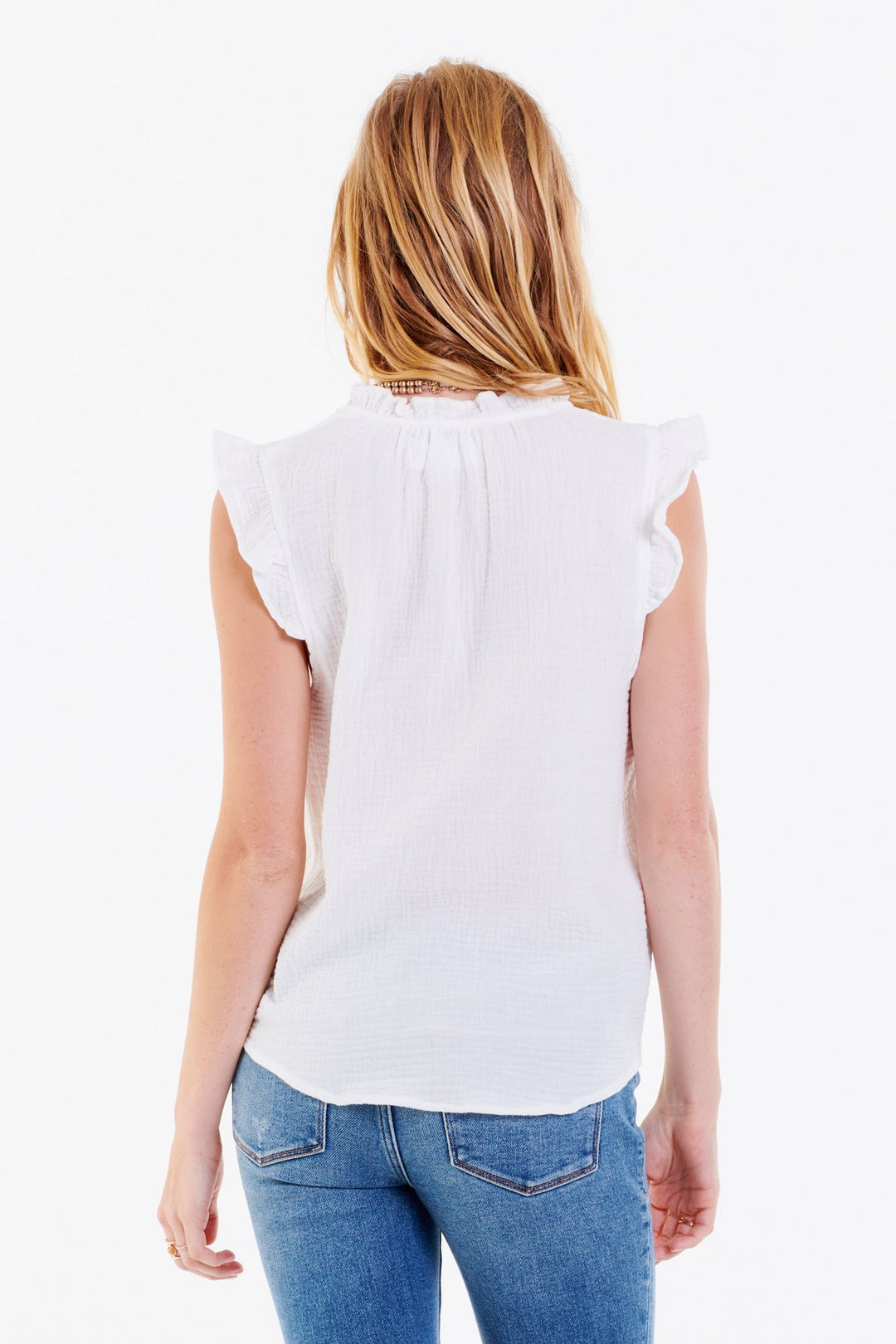 image of a female model wearing a OLGA EMBROIDERY V-NECK TOP WHITE | DEAR JOHN DENIM TOPS