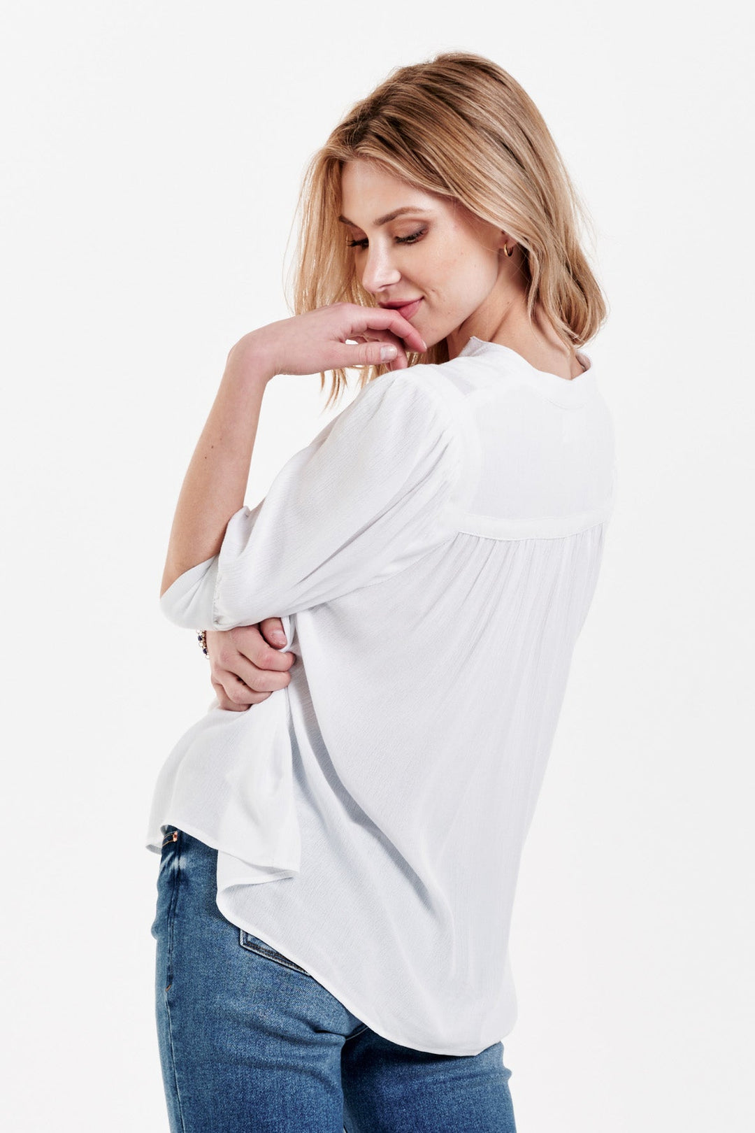 image of a female model wearing a RAVEN PUFF CUFF TOP WHITE DEAR JOHN DENIM 