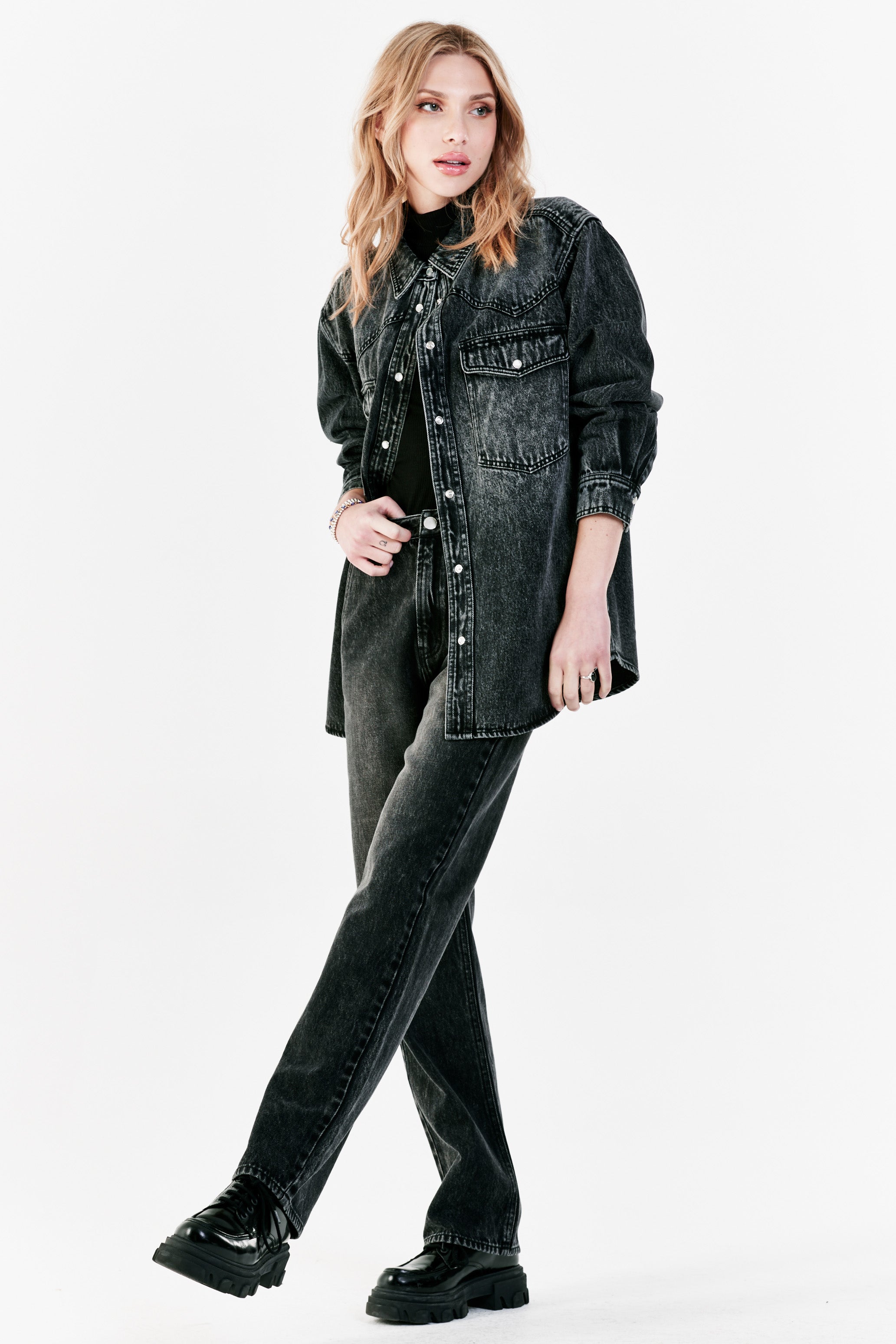 Meagan Brandon fashion blogger wears oversized western denim shirt with  black distressed jeans, tan suede booties and Saint Laurent tan suede Sac  de Jour - Meagan's Moda