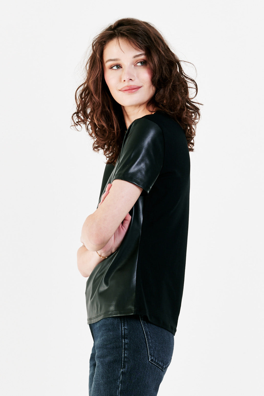 image of a female model wearing a REESE MIX MEDIA VEGAN LEATHER TOP BLACK DEAR JOHN DENIM 
