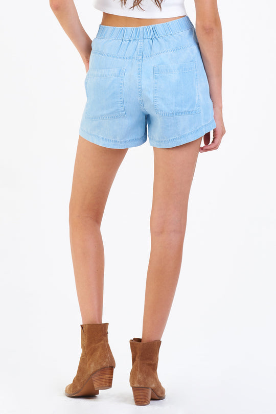 image of a female model wearing a MADDIE SUPER HIGH RISE SHORTS PERFECT BLUE SHORTS