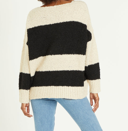 image of a female model wearing a ADRIEN STRIPE BLACK CREME RELAXED FIT SWEATER SWEATERS