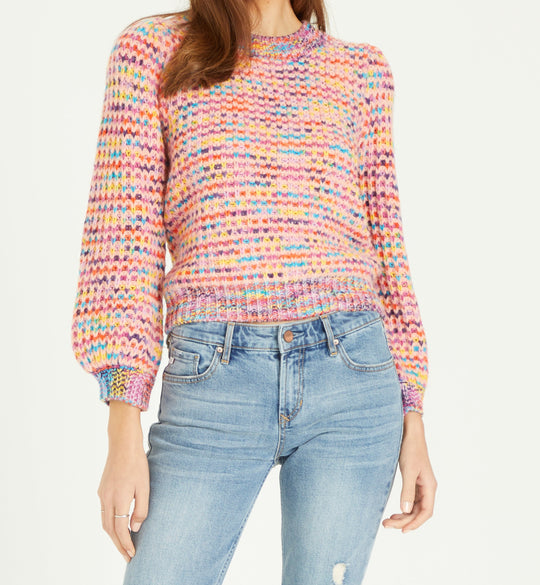 image of a female model wearing a JASLYNN PRISM PINK SWEATERS