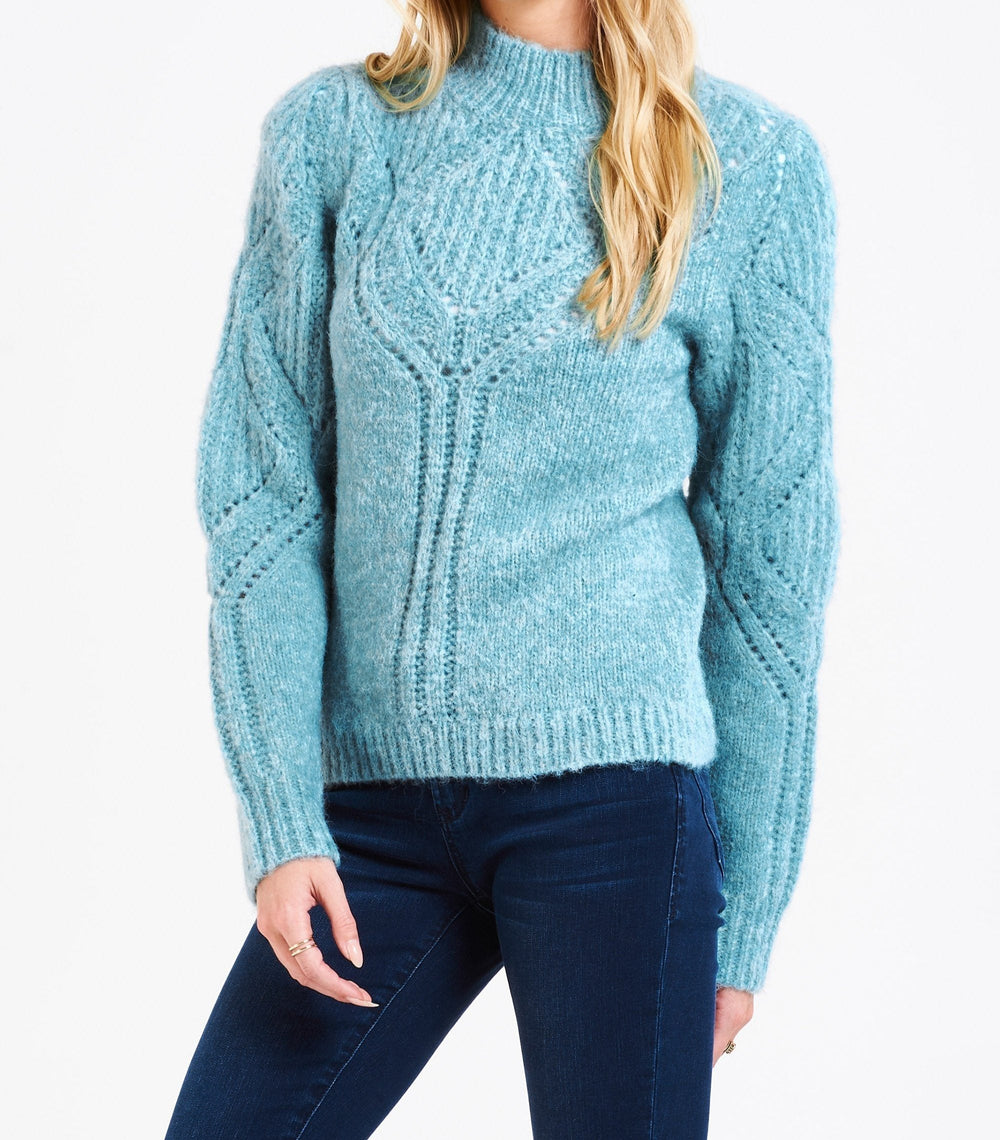 image of a female model wearing a KELSEI MOCK NECK SWEATER ARCTIC BLUE DEAR JOHN DENIM 