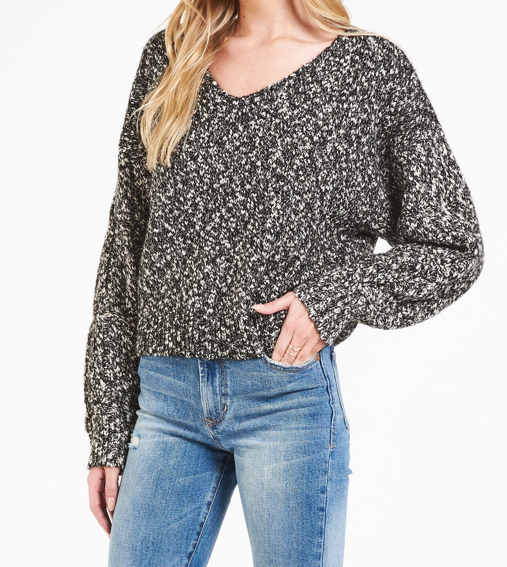 image of a female model wearing a LEXI DROP SHOULDER SWEATER SHIMMER BLACK DEAR JOHN DENIM 