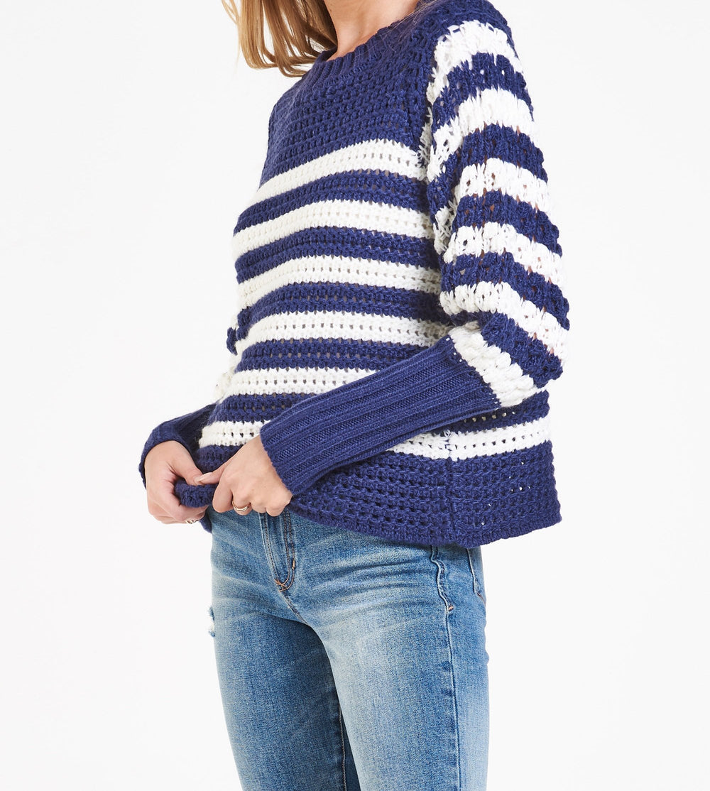 image of a female model wearing a NATALIE WIDE NECK SWEATER NAVY STRIPE DEAR JOHN DENIM 