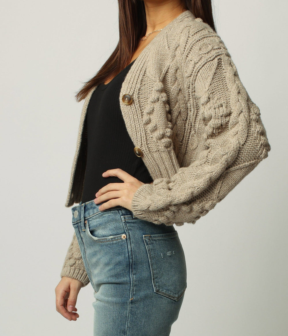 image of a female model wearing a SASHA LONG SLEEVE CARDIGAN SWEATER OATMEAL DEAR JOHN DENIM 