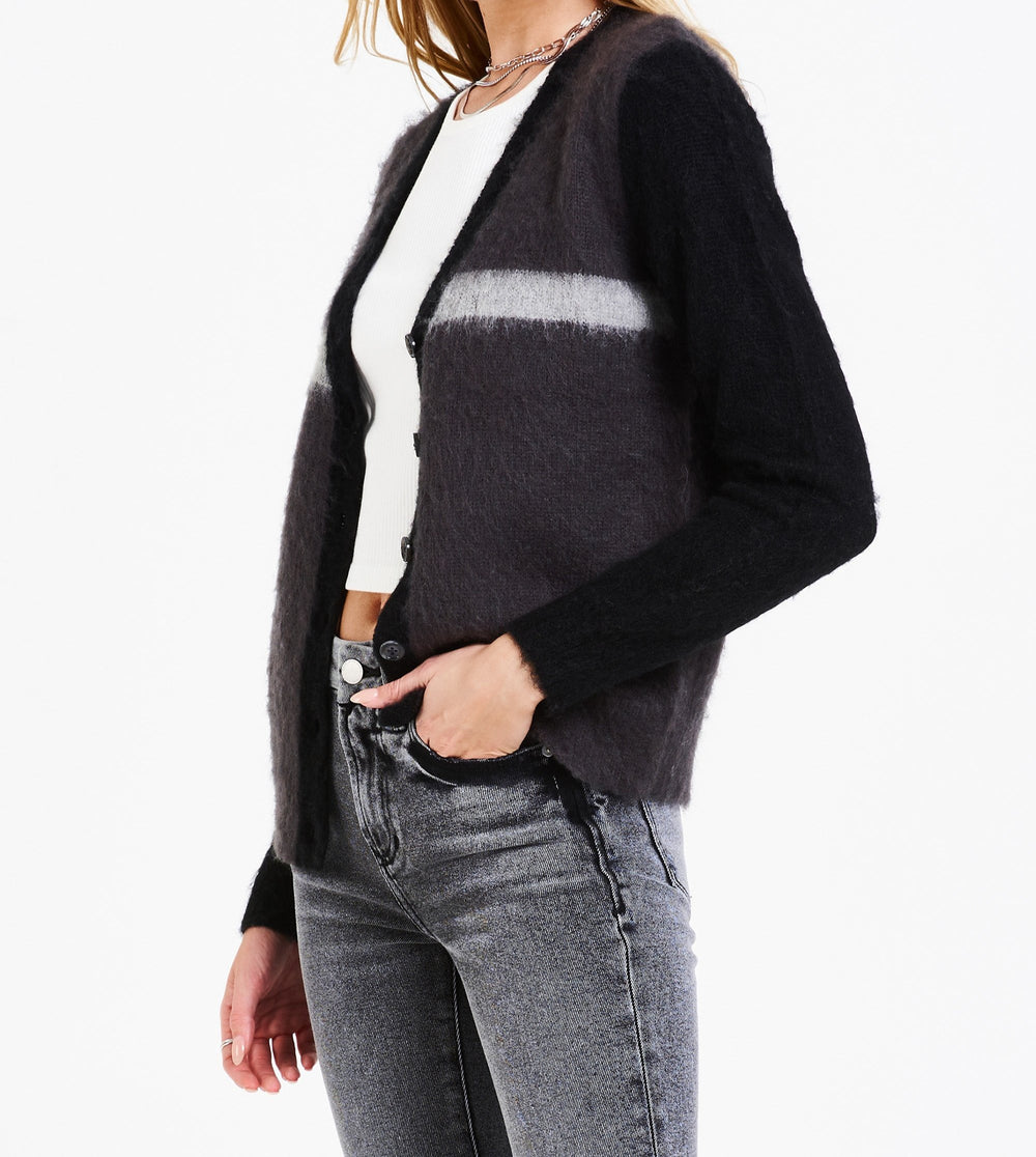 image of a female model wearing a NIA LONG SLEEVE CARDIGAN SWEATER BLACK RADIANT DEAR JOHN DENIM 