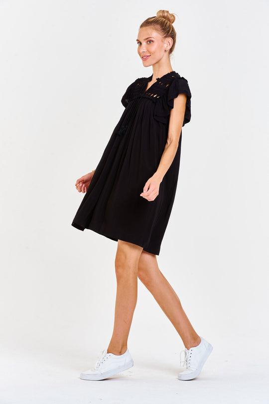 image of a female model wearing a OSIRIS KNOTTED EMBROIDERY DRESS BLACK DEAR JOHN DENIM 