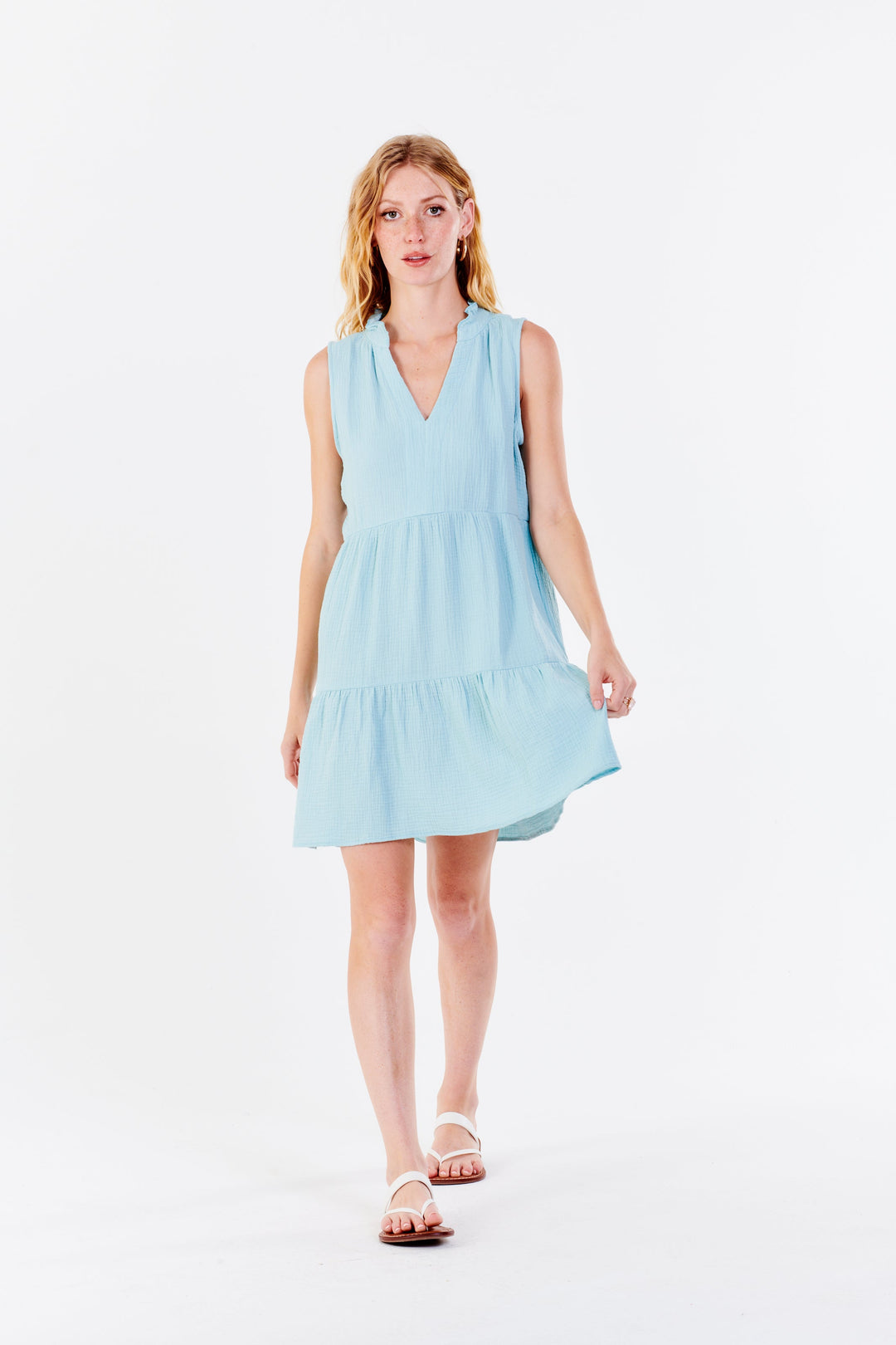 image of a female model wearing a HELENA SLEEVELESS MIDI DRESS ARTIC BLUE DRESSES