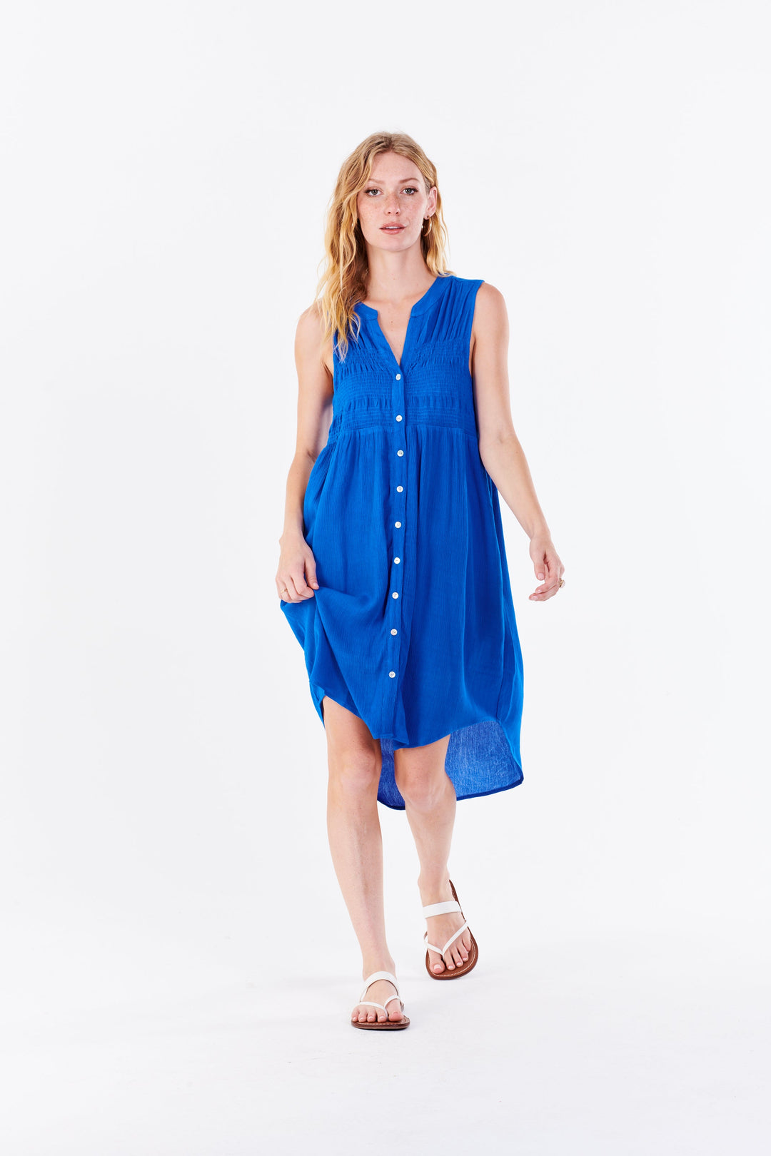image of a female model wearing a VIOLETA BUTTON FRONT DRESS IRIS BLUE DRESSES