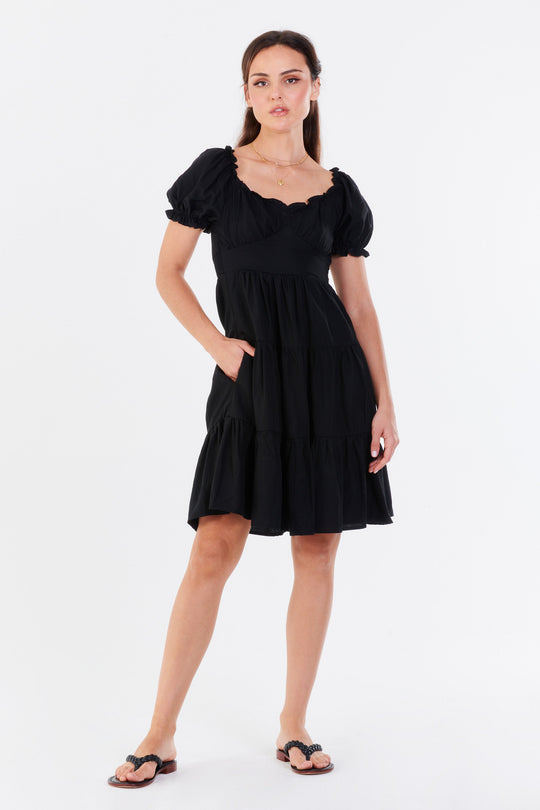 image of a female model wearing a JESSIE PUFF SLEEVE DRESS BLACK DRESSES