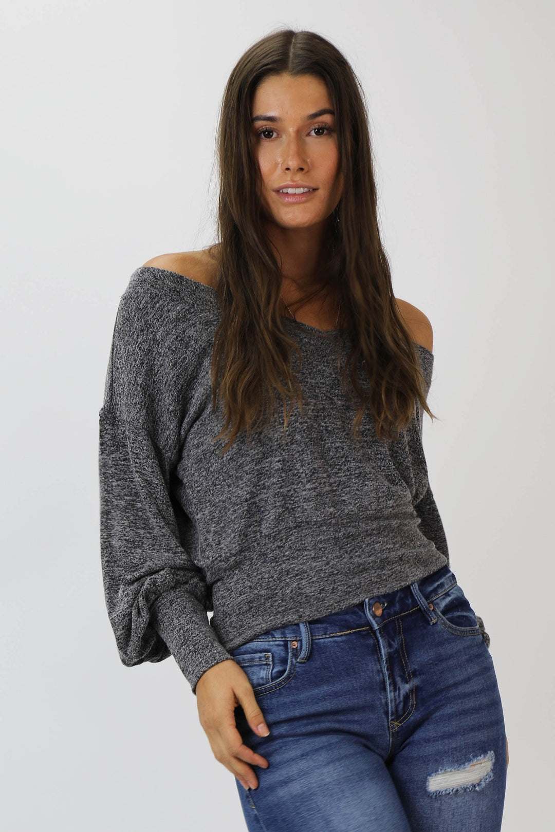 image of a female model wearing a OLLIE HEATHERED BLACK TOP TOPS